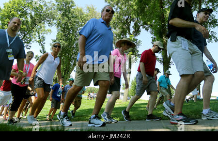 Silvis, Iowa, USA. 15th July, 2017. Fans walk the hills as they follow the leaders group on the ninth hole, Saturday, July 15, 2017, during third round action of the John Deere Classic at TPC Deere Run in Silvis. Credit: John Schultz/Quad-City Times/ZUMA Wire/Alamy Live News Stock Photo