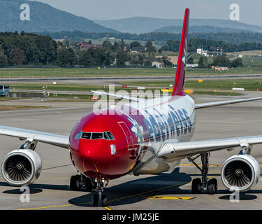 Taxiing to the gate this colored Airbus A330 at Zurich, Switzerland Stock Photo