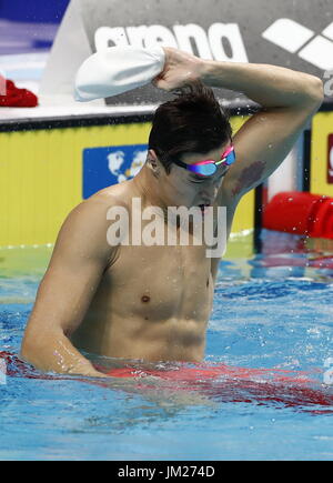 Budapest. 25th July, 2017. China's Sun Yang celebrates after the men's 200m freestyle swimming event at the 17th FINA World Championships in Budapest, Hungary on July 25, 2017. Sun Yang won the gold with 1:44.39. Credit: Ding Xu/Xinhua/Alamy Live News Stock Photo