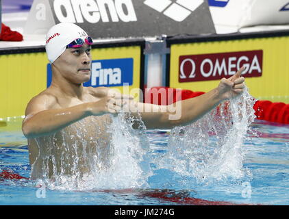 Budapest. 25th July, 2017. China's Sun Yang celebrates after the men's 200m freestyle swimming event at the 17th FINA World Championships in Budapest, Hungary on July 25, 2017. Sun Yang won the gold with 1:44.39. Credit: Ding Xu/Xinhua/Alamy Live News Stock Photo