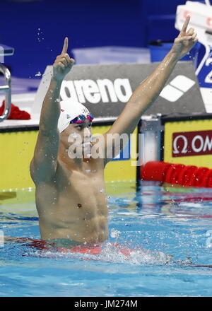 Budapest. 25th July, 2017. China's Sun Yang celebrates after the men's 200m freestyle swimming event at the 17th FINA World Championships in Budapest, Hungary on July 25, 2017. Sun Yang won the gold with 1:44.39. Credit: Ding Xu/Xinhua/Alamy Live News Stock Photo