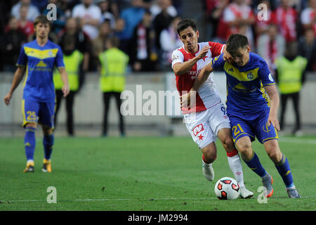 Prague, Czech Republic. 25th July, 2017. L-R Dzmitry Baha (BATE), Ruslan Mingazow (Slavia) and Stanislaw Drahun (BATE) in action during the third qualifying round match within UEFA Champions League between SK Slavia Praha and FC BATE Borisov in Prague, Czech Republic, on July 25, 2017. Credit: Ondrej Deml/CTK Photo/Alamy Live News Stock Photo