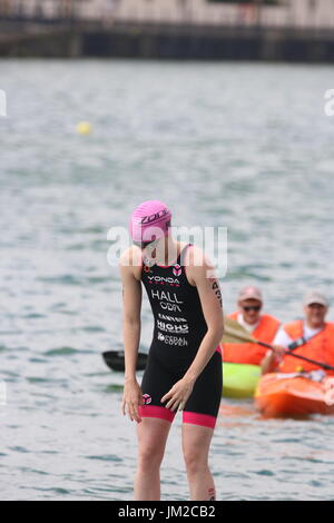Team GB elite and Olympian triathlete Lucy Hall about to enter the water for the swim at London Triathlon Stock Photo