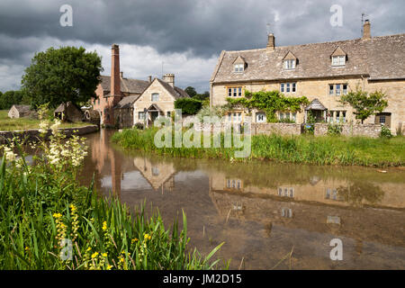 The Old Mill and Cotswold cottages on River Eye, Lower Slaughter, Cotswolds, Gloucestershire, England, United Kingdom, Europe Stock Photo