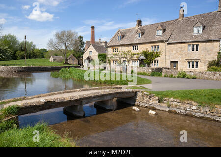 Stone bridge and Cotswold cottages on River Eye, Lower Slaughter, Cotswolds, Gloucestershire, England, United Kingdom, Europe Stock Photo