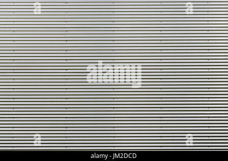 Corrugated metal sheet. Silver gray background pattern. Stock Photo