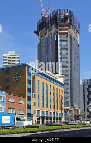 A new tower block under construction on Stratford High Street in East London, UK. The area has benefitted from proximity to the 2012 Olympic Park. Stock Photo