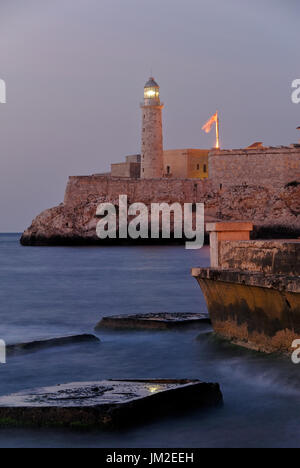 El Morro spanish fortress with lighthouse, cannons and cuban flag in th  foreground, with sea in the background, Havana, Cuba 18835008 Stock Photo  at Vecteezy