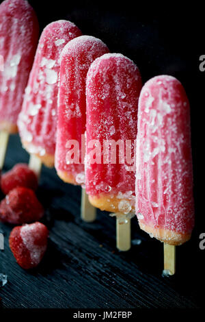Youth ice pop from the freezer. with a touch of frost and ice. Refreshing in the heat . Stock Photo