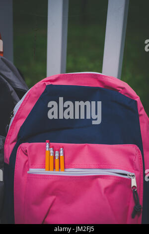 A book bag, backpack with school supplies for back to school. Stock Photo