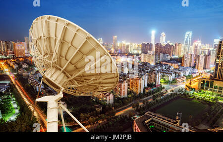 City night view and dish antenna, Shanghai, china. Stock Photo