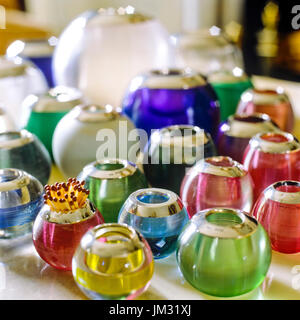 Collection of vibrant candle holders Stock Photo