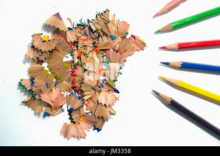 sawdust of several colorful pencils on white background Stock Photo