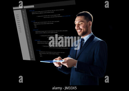 businessman with tablet pc and virtual coding Stock Photo