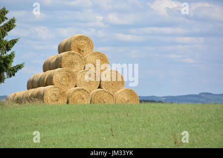 Kall, Germany - July 21, 2017 - Beautiful Eifel in Germany with hay Stock Photo