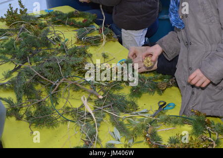 Building Christmas wreaths Stock Photo