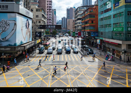 HONG KONG - JULY 17, 2014:  Crosswalk  in central commercial area  of Hong Kong Stock Photo