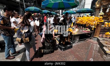 The Erawan Shrine Area Tourist Attraction Bangkok Thailand is the center most point of the city Stock Photo