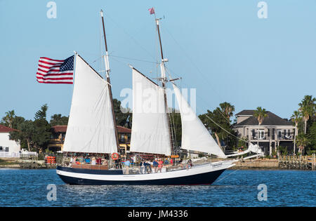 The Freedom Schooner sets sail from the harbour in St Auguastine, Florida on on its sunset cruise. Stock Photo