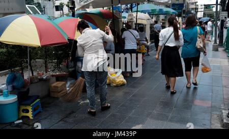 The Erawan Shrine Area Tourist Attraction Bangkok Thailand is the center most point of the city Stock Photo