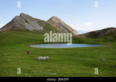 Mother and son hiking to Lac de Souliers Hautes Alpes France