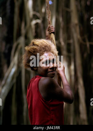 Portrait of a teenage girl with blonde hair, Efate Island, Port Vila, Vanuatu Stock Photo