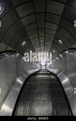 Empty escalator on the London underground, looking down. Stock Photo