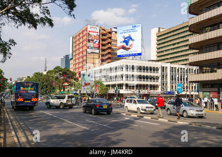 Vehicles Driving Through Market And Koinange Street Junction, Nairobi, Kenya Stock Photo