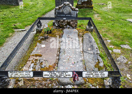 Coins on the graves of Rob Roy MacGregor, his wife Mary and his two sons Coll and Robin at the Balquhidder kirkyard, Stirling, Scotland, UK Stock Photo