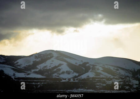 Sunrise coming over a mountain in Utah. Stock Photo