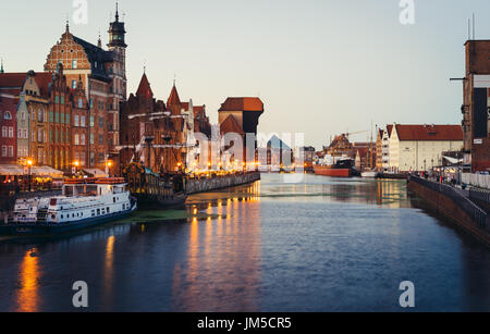GDANSK, POLAND - SEPTEMBER 13 2016: Motlawa River Embankment (Dlugie Pobrzeze) with the Crane, one of the most famous symbols of Gdansk, in the evenin Stock Photo