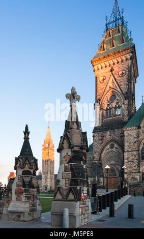 The West Block that is Part of Parliament Hill with the Peace Tower and Centre Block in the background lit by the rising morning sun in Ottawa. Stock Photo