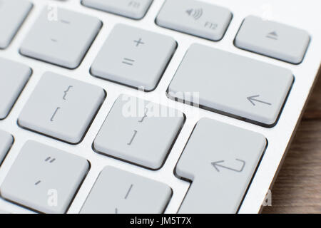 Close up detail of a white laptop keyboard viewed from the top showing the function keys to the side Stock Photo