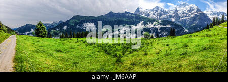 Spectacular panoramic view of Eiger, Monch, Jungfrau mountains from Murren-Gimmelwald trail, Swiss alps, Bernese Oberland, Berne Canton, Switzerland,  Stock Photo