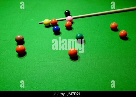 snooker balls and cue on snooker table Stock Photo