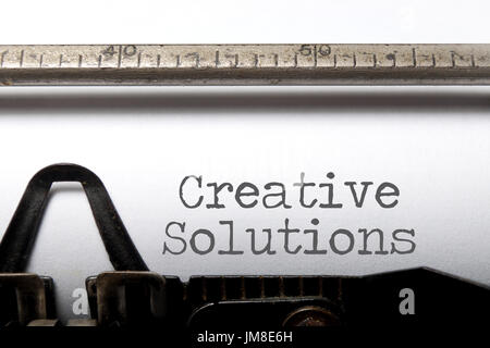 Creative solutions printed on a typewriter Stock Photo