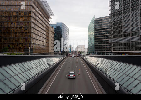 Cars coming out of a tunnel in Brussels, Rue de la Loi close to Shuman, next to the European Council and the Headquarters of European Union. Stock Photo