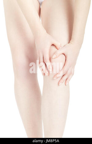 Woman fatigued legs with hands touching knee isolated on white, clipping path Stock Photo