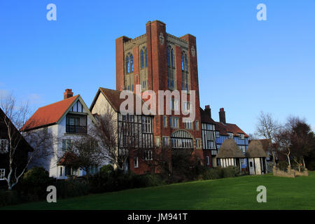 Eccentric mock Tudor architecture of water tower and houses, Thorpeness, Suffolk, England, UK Stock Photo