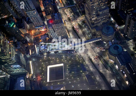 aerial view of national september 11th memorial brookfield place and liberty park through glass from the one world observatory New York City USA Stock Photo