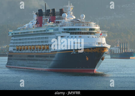 The Giant Disney Cruise Ship, Disney Wonder, Enters Vancouver Harbour At Sunrise. Stock Photo