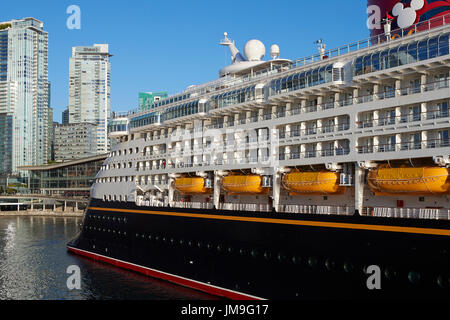 The Giant Disney Cruise Ship, Disney Wonder, Enters Vancouver Harbour At Sunrise. Stock Photo