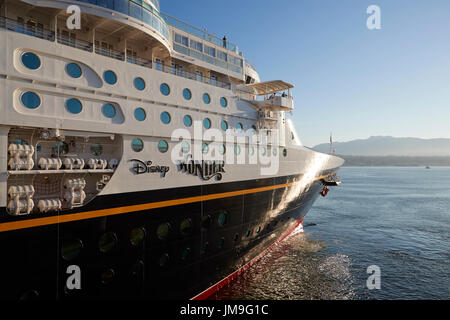 The Giant Disney Cruise Ship, Disney Wonder, Enters Vancouver Harbour At Sunrise. Stock Photo