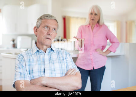 Senior Couple Having Argument At Home Stock Photo