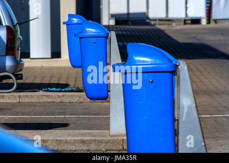 Trash can, waste container on a highway parking lot with resting place. Stock Photo