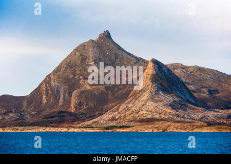 Hestmannen or Hestmonkallen ('The Horseman) is a distinctive mountain on the island of Hestmannøy, at the arctic circle, Nordland County, Norway Stock Photo