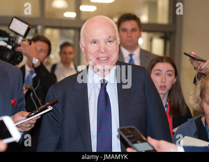 Washington DC, USA. 26th July, 2017. United States Senator John McCain (Republican of Arizona) walks to his Capitol Hill office following the vote on the repeal of the Affordable Care Act (ACA) also known as 'Obamacare' in Washington, DC on Wednesday, July 26, 2017. The Senate voted 55-45 to reject legislation undoing major portions of President Barack Obama's signature healthcare law without a plan to replace it. Credit: Ron Sachs/CNP /MediaPunch Credit: MediaPunch Inc/Alamy Live News Stock Photo