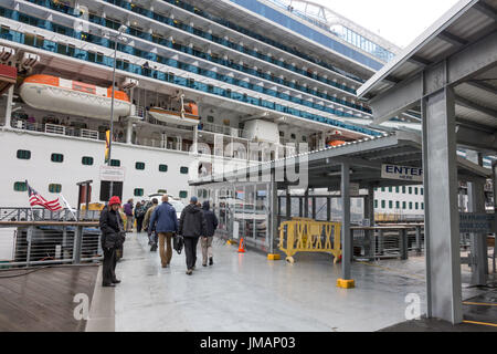 Juneau, Alaska, USA - July 26th 2017: The Emerald Princess Cruise Ship is docked at the port in Juneau while the passenger were banned to disembark after been reported a death of a Utah woman stemming from a domestic dispute aboard a cruise ship traveling in U.S. Credit: Ruben Ramos/Alamy Live News. Stock Photo