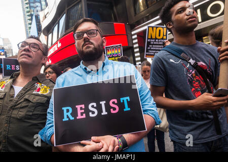 New York, NY 26 July 2017 In response to President Donald Trump's tweet to ban transgender people from the military, advocates, activists, and allies converged on the Military Recruitment Center in Times Square in protest. ©Stacy Walsh Rosenstock/Alamy Live News Stock Photo