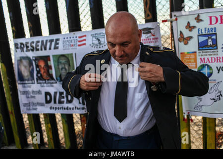 Tijuana, Baja California, Mexico. 4th July, 2017. HECTOR BARAJAS-VARELA, a deported U.S. Army veteran, puts on his 82nd Airborne Division uniform during a 4th of July celebration along the US-Mexico border in Tijuana, Baja California, Mexico. Credit: Joel Angel Juarez/ZUMA Wire/Alamy Live News Stock Photo